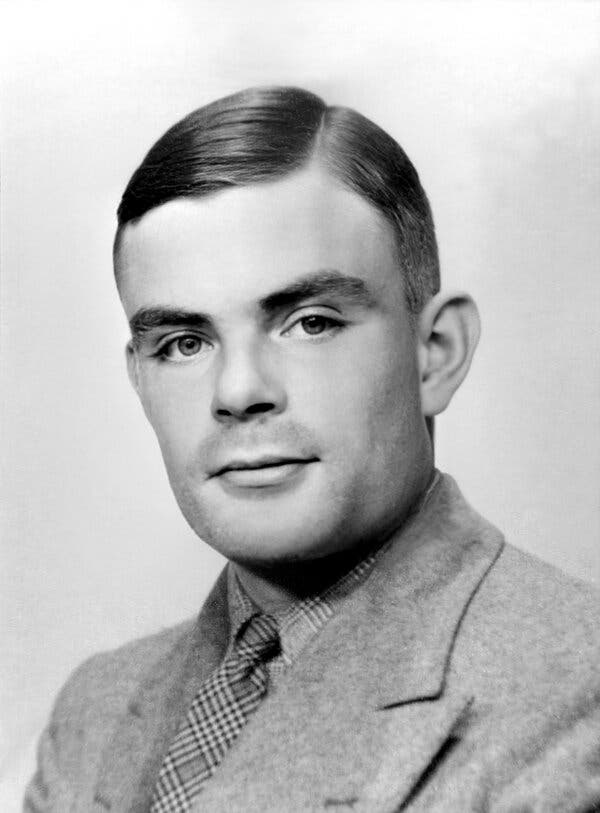 A black-and-white portrait photo of Alan Turing.