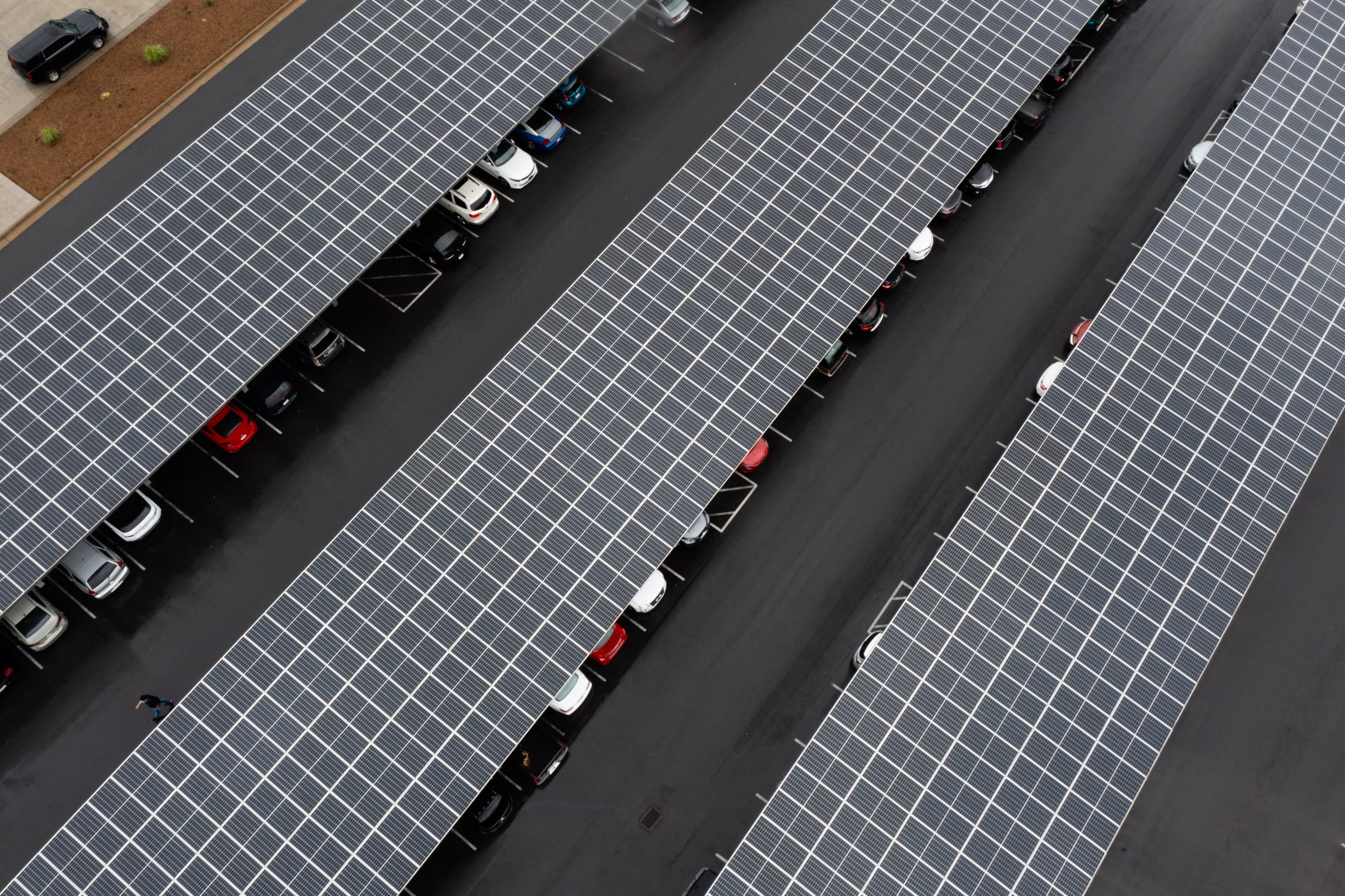 Solar panels cover parked cars at Qcells' Georgia plant.