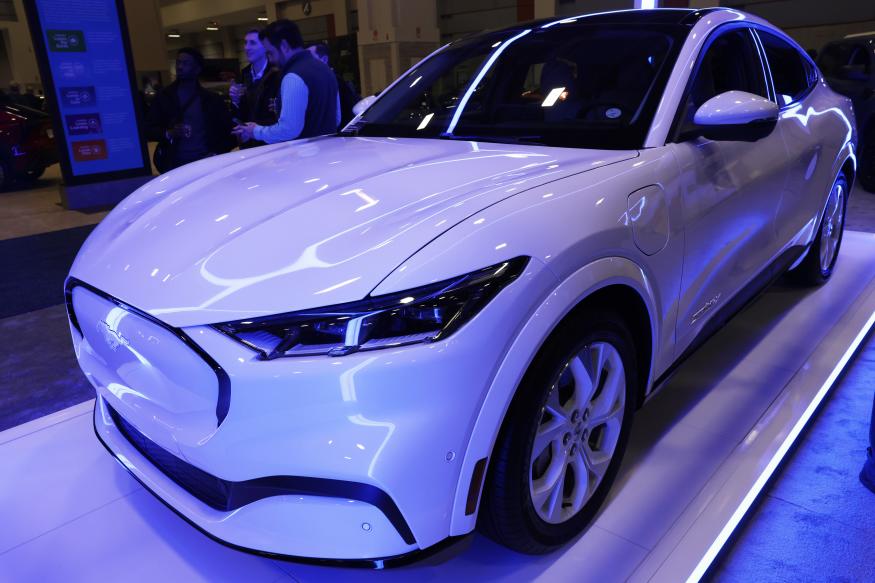 WASHINGTON, DC - JANUARY 19: A Ford Mustang Mach-E all-electric SUV is on display during a preview at the Washington, D.C. Auto Show at Walter E. Washington Convention Center on January 19, 2023 in Washington, DC. The 2023 Washington, D.C. Auto Show will be open to the public from January 20 through January 29, 2023. (Photo by Alex Wong/Getty Images)