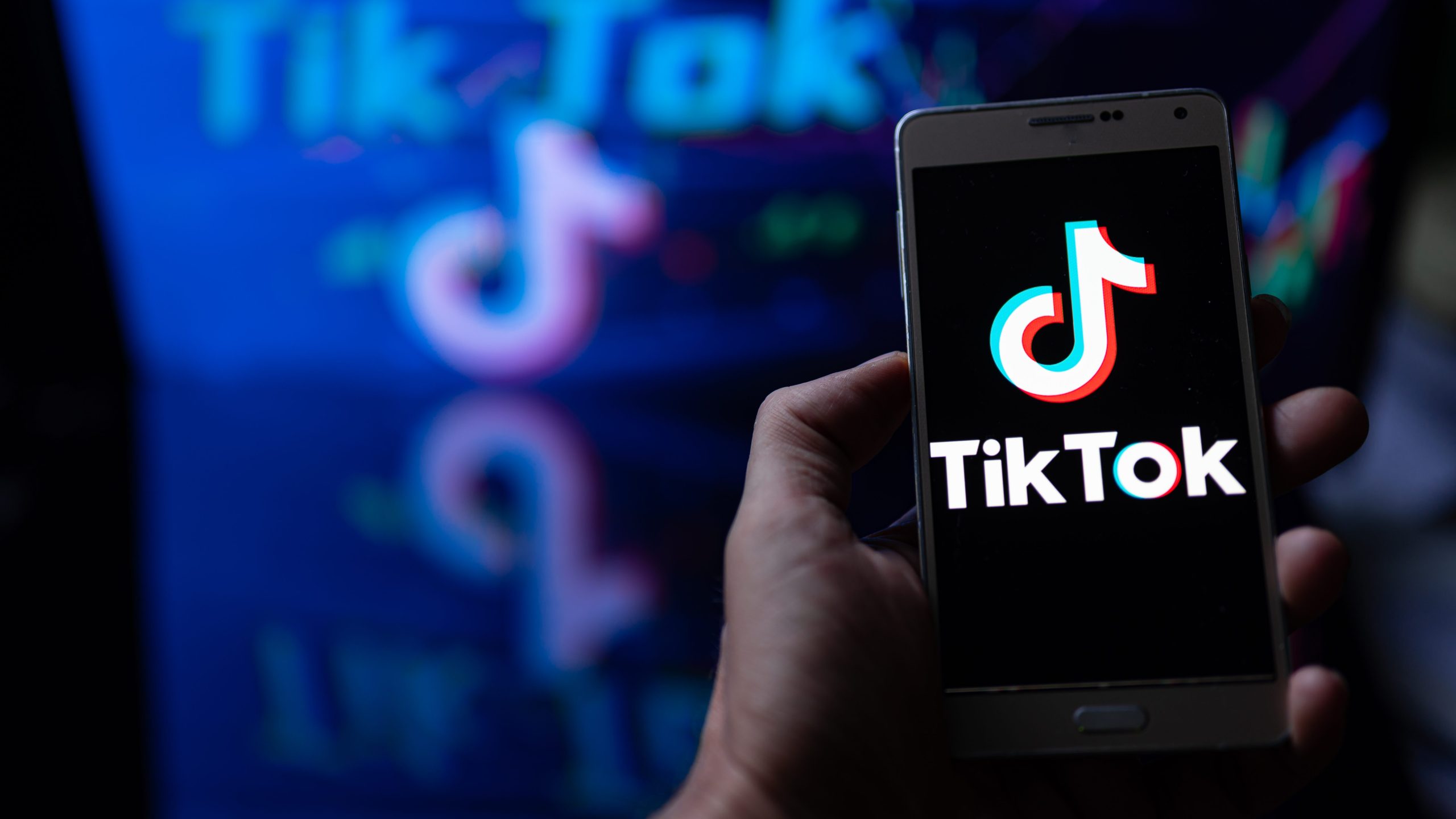 TikTok logo displayed on a smartphone