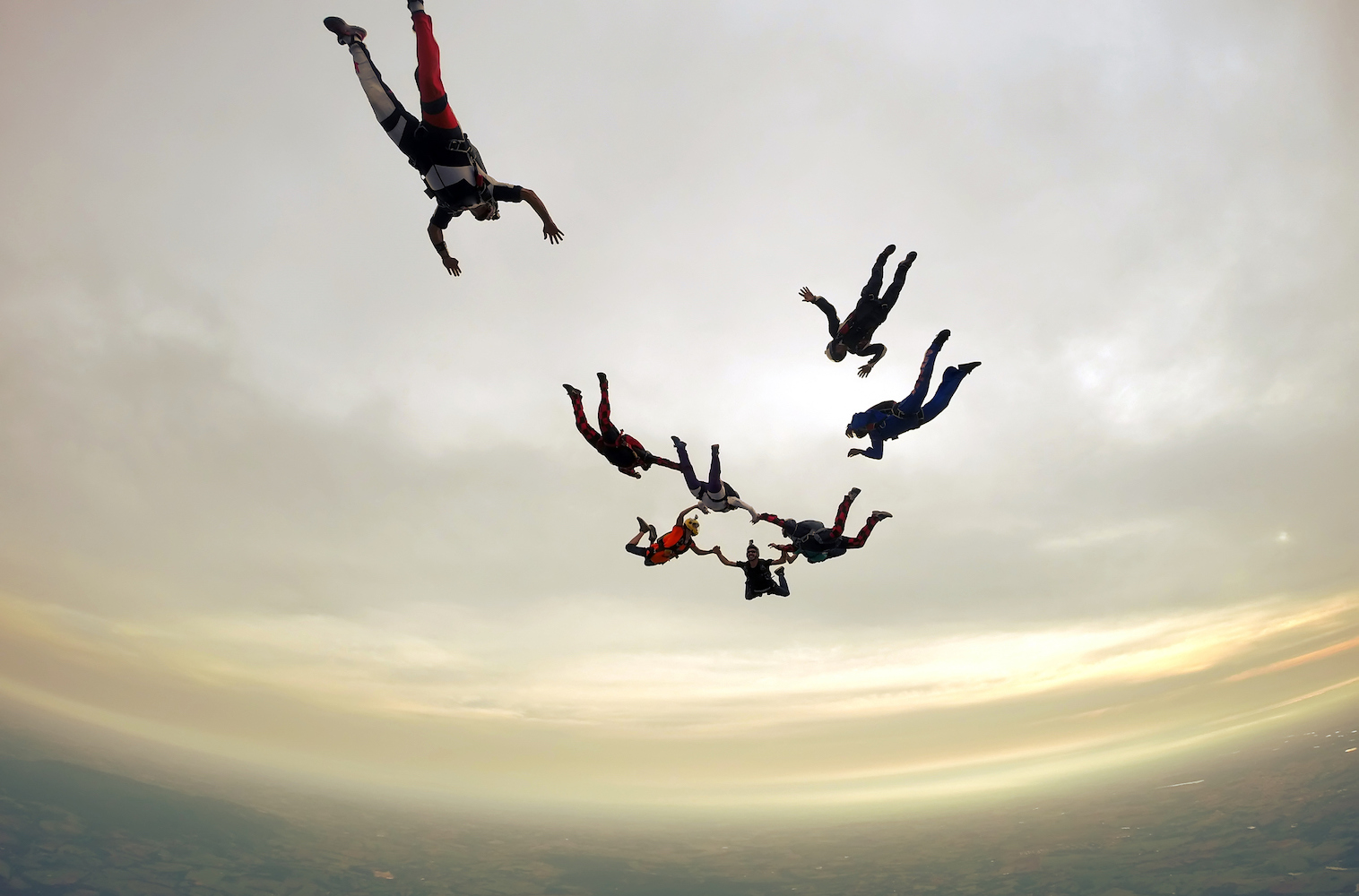 Skydiving group cloudy day