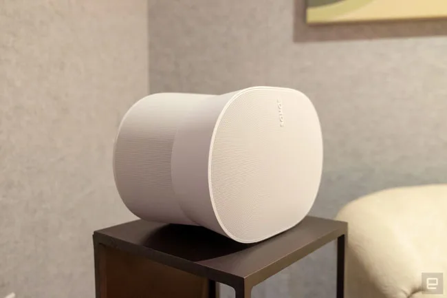 Image of the new Sonos Era 300 on a table in a fake living room.