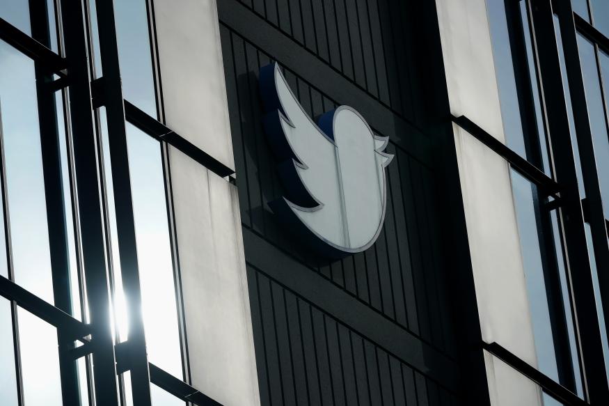 FILE - A Twitter logo hangs outside the company's offices in San Francisco, on Dec. 19, 2022. Twitter experienced a bevy of glitches Monday, March 6, 2023 as links stopped working, some users were unable to log in and images were not loading for others. (AP Photo/Jeff Chiu, File)