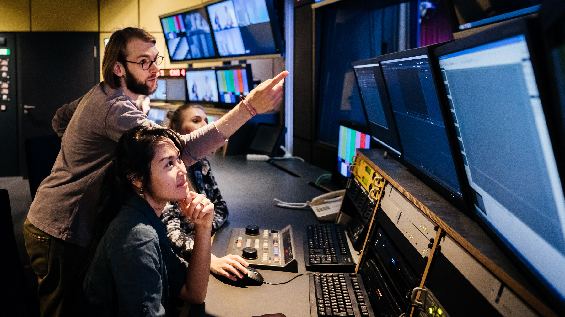 A stock image of a data security team reviewing security data.