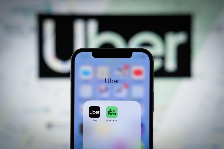 The Uber app application with a map of New York City is seen on an Apple iPhone mobile phone in this photo illustration  Warsaw, Poland on 21 September, 2022. (Photo by STR/NurPhoto via Getty Images)