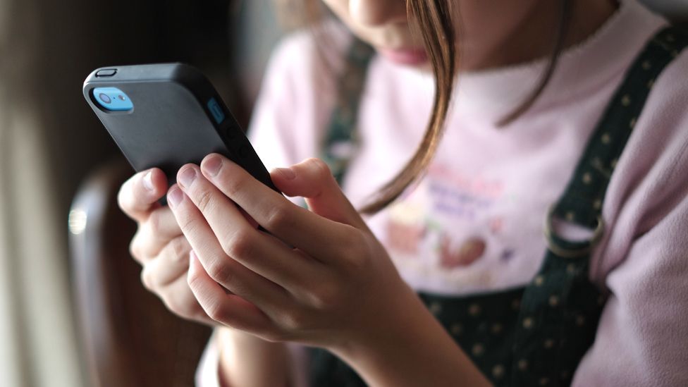 Girl looking at a smartphone