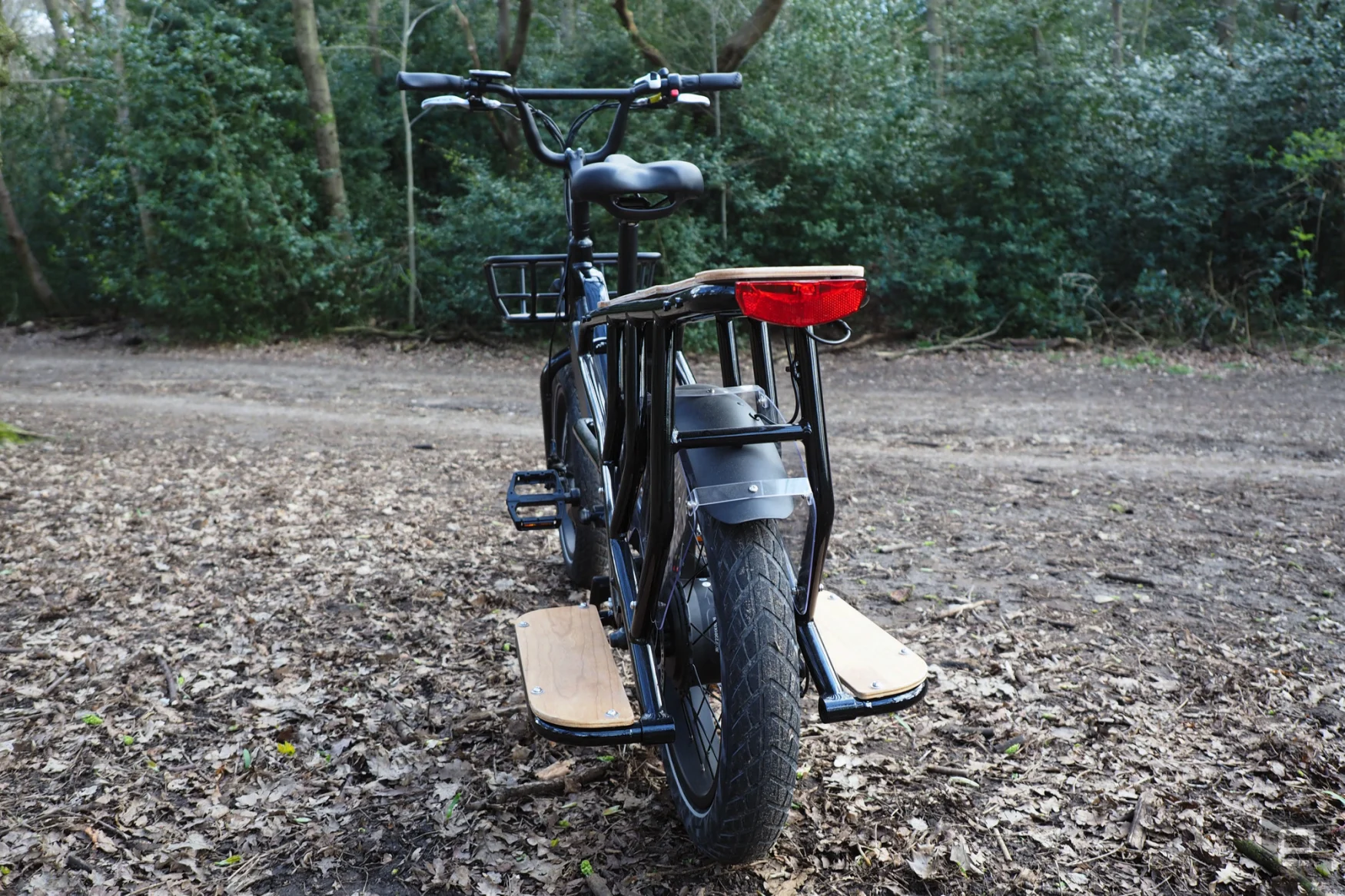 Image of the Mycle Cargo bike in a wood.