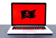 laptop with a pirate flag