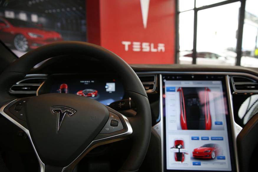 NEW YORK, NY - JULY 05:  The inside of a Tesla vehicle is viewed as it sits parked in a new Tesla showroom and service center in Red Hook, Brooklyn on July 5, 2016 in New York City. The electric car company and its CEO and founder Elon Musk have come under increasing scrutiny following a crash of one of its electric cars while using the controversial autopilot service. Joshua Brown crashed and died in Florida on May 7 in a Tesla car that was operating on autopilot, which means that Brown's hands were not on the steering wheel.  (Photo by Spencer Platt/Getty Images)