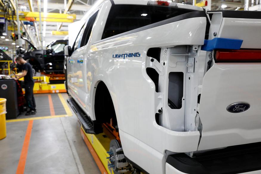 Ford Motor Co. battery powered F-150 Lightning trucks under production at their Rouge Electric Vehicle Center in Dearborn, Michigan on September 20, 2022. (Photo by JEFF KOWALSKY / AFP) (Photo by JEFF KOWALSKY/AFP via Getty Images)