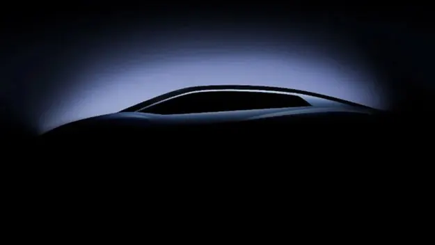 Image of the new Lamborghini EV shrouded in shadow, with only the roofline visible.