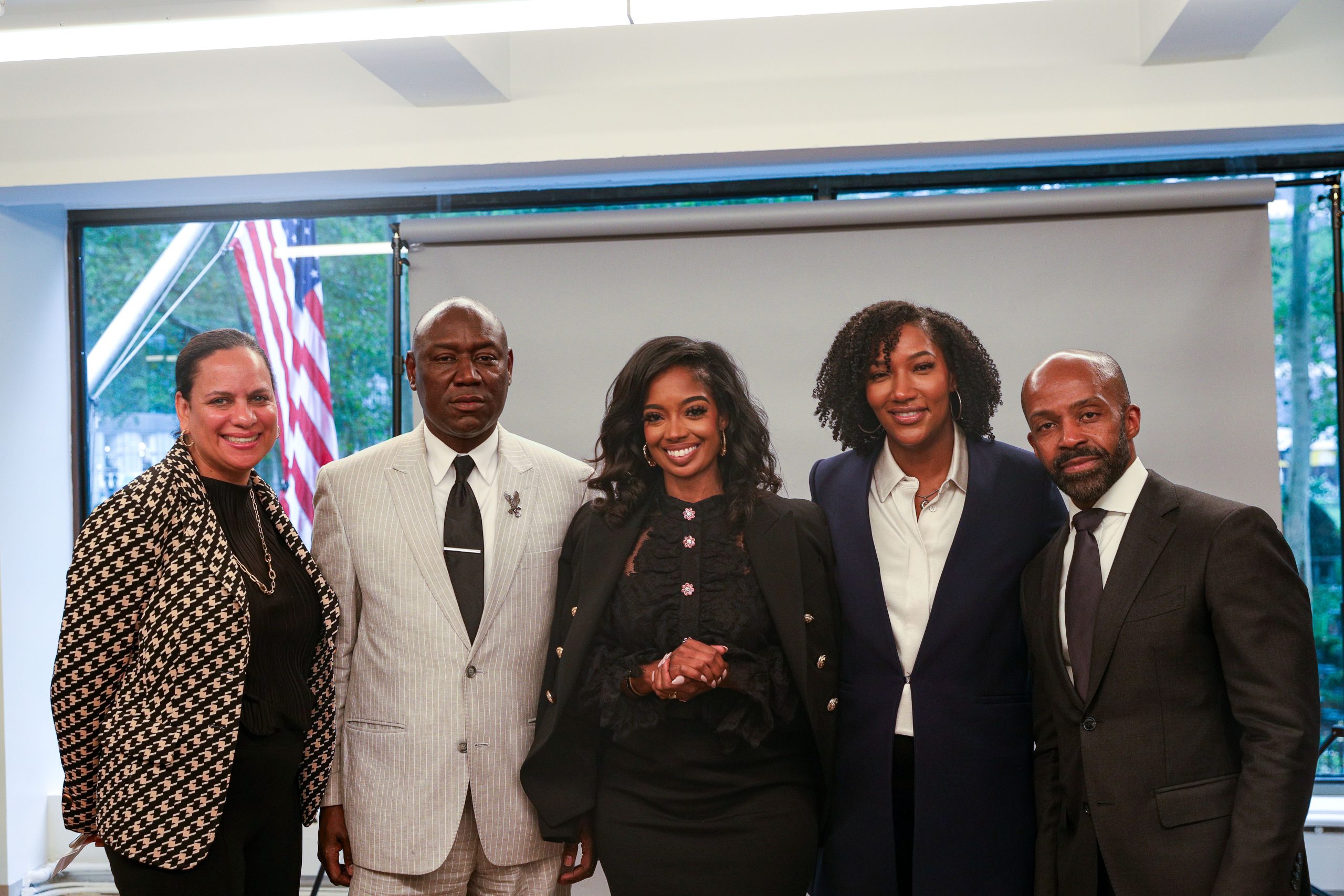 The founders of Fearless Fund and their legal counsel stand for photos at a press conference in New York City.