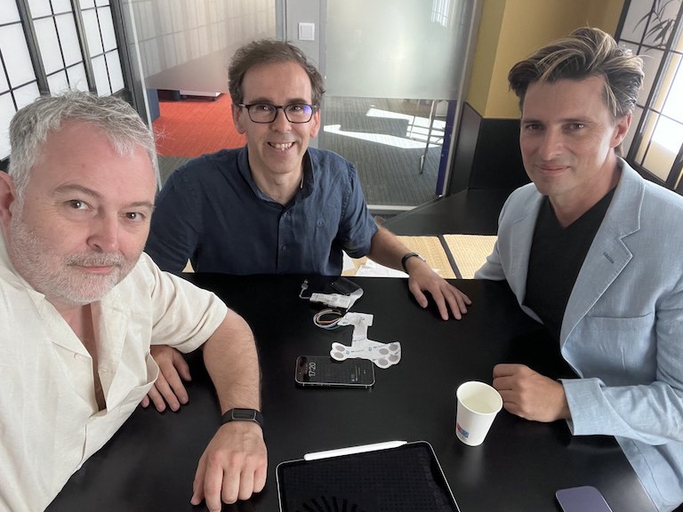 [L to R] Mike Butcher, TechCrunch; Paulo Dimas, Unbabel VP of Product Innovation; Vasco Pedro, Unbabel CEO/co-founder, with the Halo device.