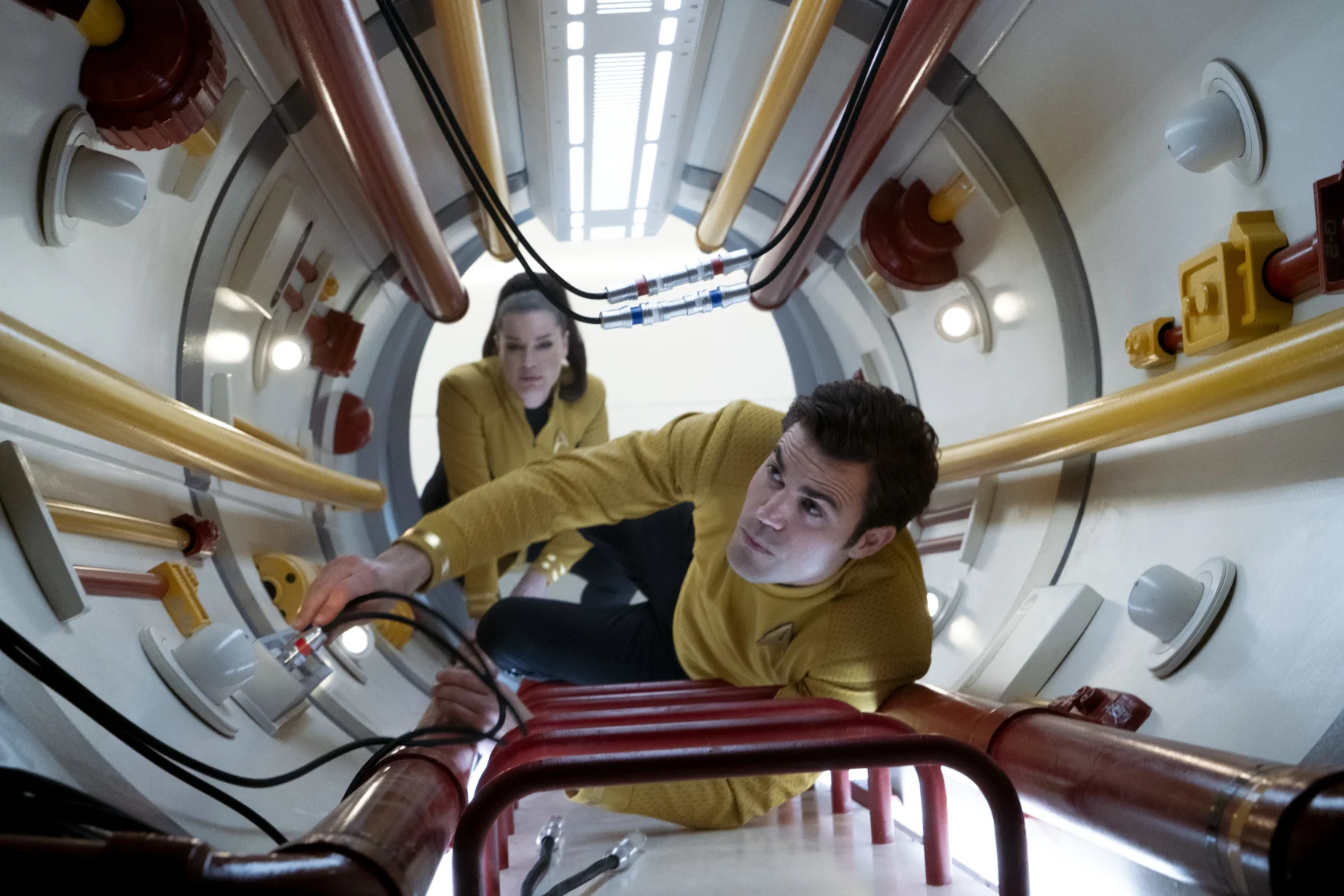 L-R Rebecca Romijn as Una and Paul Wesley as James T. Kirk in Star Trek: Strange New Worlds streaming on Paramount+, 2023. Photo Credit: Michael Gibson/Paramount+