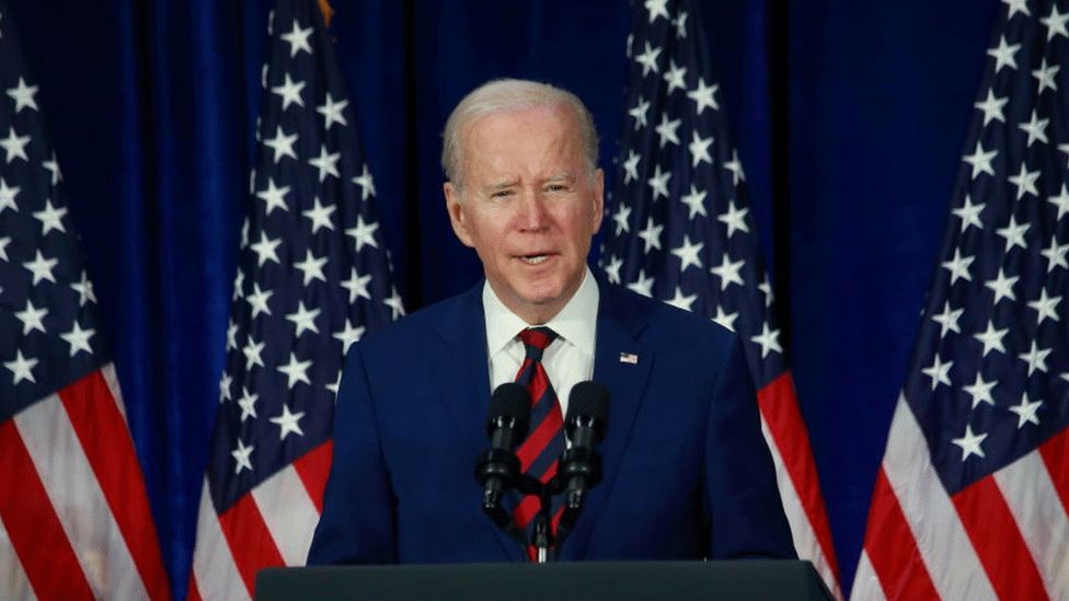 Joe Biden with US flags