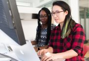 women working on laptop